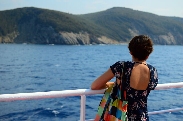 Girl overlooking Tuscan Coast