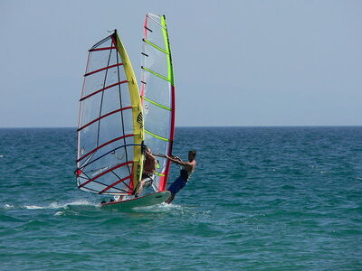 Windsurfing off the Tuscan coast