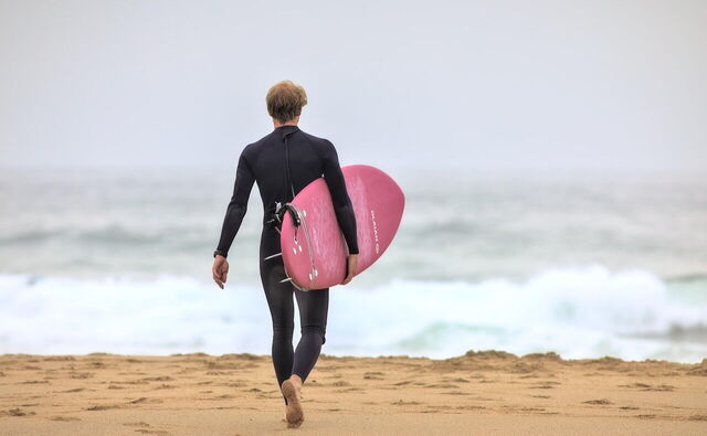 Man going surfing