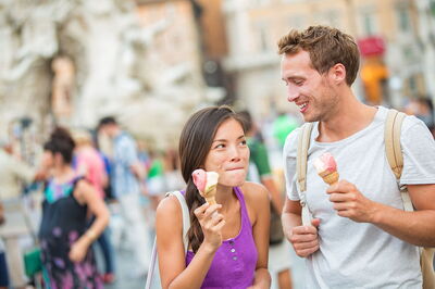 A couple eating gelato