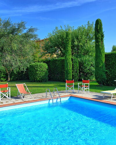 Villa Fiamma: Water, Plant, Sky, Swimming Pool, Property, Furniture, Green, Azure, Nature, Blue