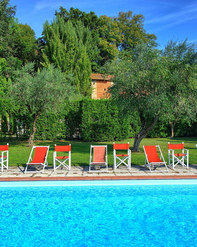 Villa Fiamma: Water, Sky, Plant, Nature, Cloud, Tree, Natural Landscape, Swimming Pool, Leisure, Grass