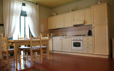 Ginepro: Room, Furniture, Cabinetry, Property, Kitchen, Floor, Countertop, Hardwood, Wood Flooring, Building