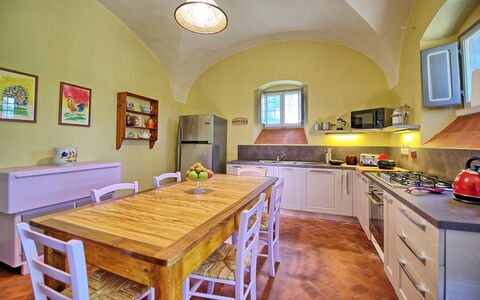 Villa Marietta: Countertop, Room, Furniture, Property, Building, Kitchen, Yellow, Interior Design, Ceiling, Cabinetry