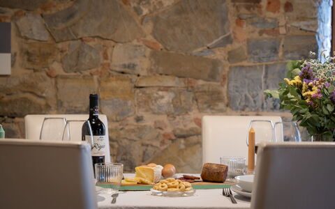 Villa Fracassini: Food, Table, Bottle, Tableware, Plant, Drinkware, Plate, Interior Design, Flower, Wood