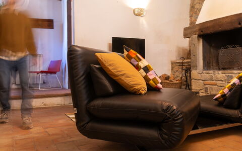 La Miccia: Furniture, Flooring, Interior Design, Floor, Living Room, Couch, Comfort, Room, Orange, Home