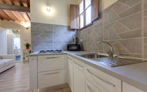 Residenza Monna Lisa: Property, Countertop, Room, Cabinetry, Tile, Kitchen, Furniture, Interior Design, Building, Floor