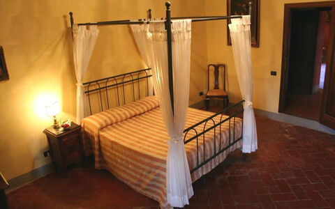 Villa Sieve: Bed, Furniture, Room, Bedroom, Bed Frame, Property, Hardwood, Four-Poster, Canopy Bed, Floor