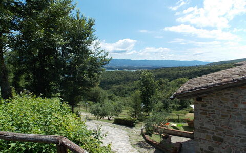 Villa Latera: Property, Wilderness, Sky, Mountain, Tree, House, Landscape, Cottage, Rural Area, Vacation