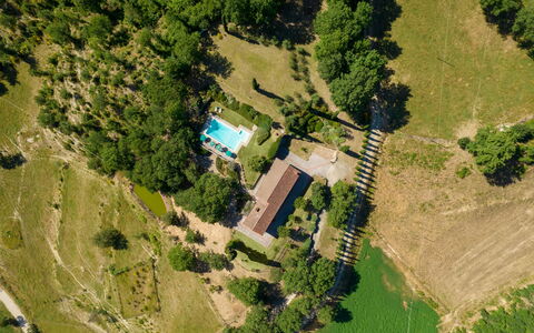 Podere Schignano: Plant, Building, Ecoregion, Natural Landscape, Tree, Land Lot, Urban Design, House, Biome, Slope