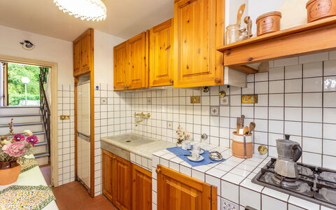 La Ripresa: Property, Room, Kitchen, Countertop, Building, Cabinetry, House, Real Estate, Furniture, Yellow