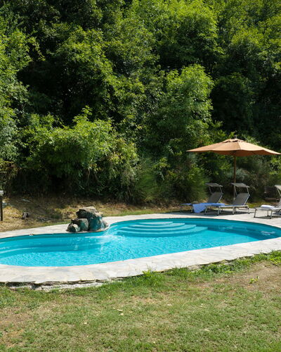 Villa Paola: Swimming Pool, Outdoor Furniture, Leisure, Resort, Backyard, Garden, Shade, Landscaping, Water Feature, Eco Hotel