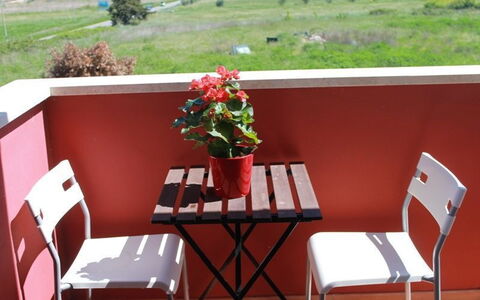 Scarlino Summer Village: Red, Table, Furniture, Room, Chair, Outdoor Table, House, Flowerpot, Plant, Restaurant