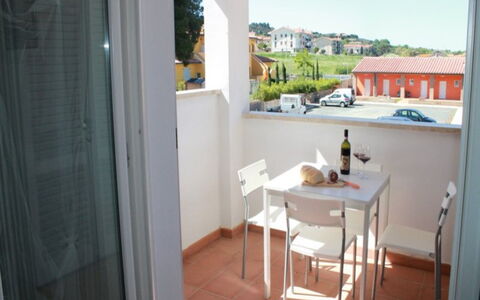 Scarlino Summer Village: Property, Room, Building, House, Real Estate, Apartment, Furniture, Interior Design, Floor, Balcony