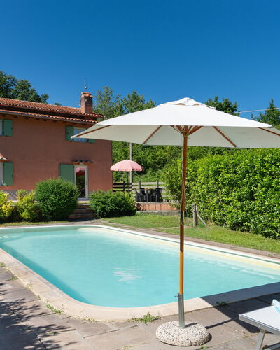 Villa Il Nido: Water, Plant, Sky, Property, Building, Azure, Shade, Swimming Pool, Tree, Land Lot
