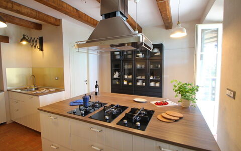 Villa Miramare: Countertop, Room, Property, Kitchen, Cabinetry, Furniture, Building, Ceiling, Interior Design, Kitchen Stove