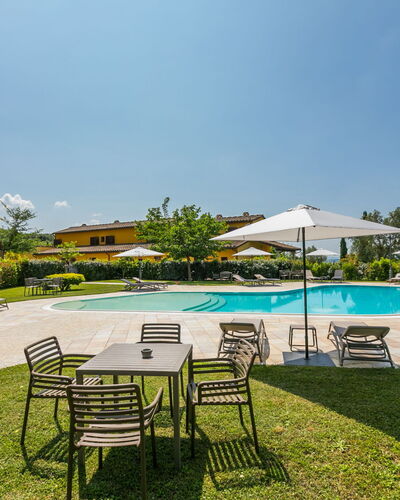 Il Casale: Sky, Plant, Property, Swimming Pool, Umbrella, Outdoor Furniture, Shade, Chair, Tree, Seaside Resort