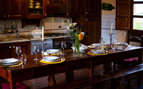 Collina dei Fiori: Countertop, Room, Furniture, Kitchen, Property, Cabinetry, Interior Design, Table, Dining Room, Home