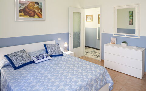 Giulia Apartment - Levanto: Property, Furniture, Building, Mirror, Picture Frame, Comfort, Azure, Interior Design, Cabinetry, Wood