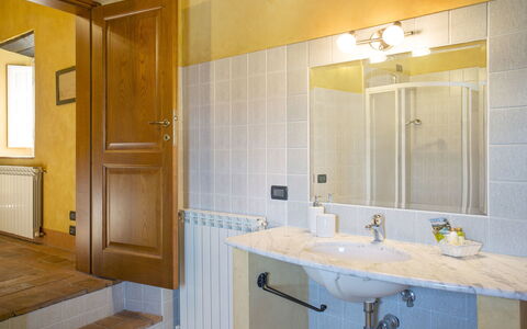 Montefiore: Bathroom, Room, Property, Yellow, Interior Design, Bathroom Cabinet, Building, Tile, Wall, House