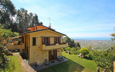 Villa La Collinetta: Sky, Plant, Building, Cloud, Property, Window, Tree, Land Lot, House, Wood