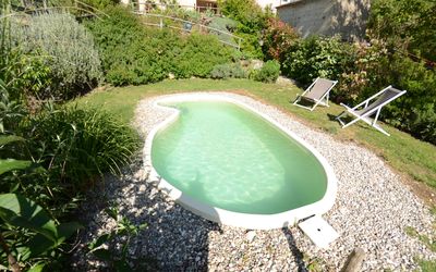 Al Colle Di Lari: Swimming Pool, Property, Natural Landscape, Grass, Water, House, Real Estate, Leisure, Estate, Landscape