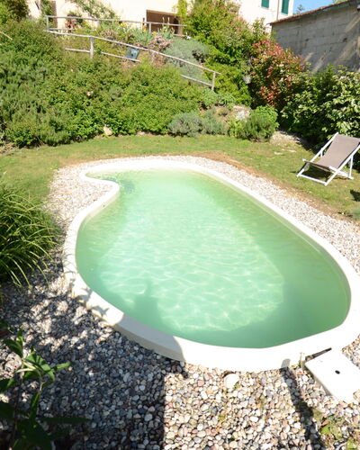 Al Colle Di Lari: Swimming Pool, Property, Natural Landscape, Grass, Water, House, Real Estate, Leisure, Estate, Landscape
