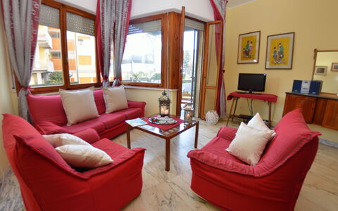 Carnevale: Living Room, Furniture, Room, Property, Interior Design, Building, Couch, Real Estate, Curtain, House