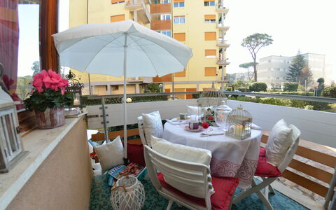 Carnevale: Property, Furniture, Room, Building, Restaurant, Home, Umbrella, Table, Real Estate, Interior Design