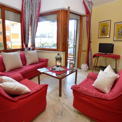 Carnevale: Living Room, Furniture, Room, Property, Interior Design, Building, Couch, Real Estate, Curtain, House