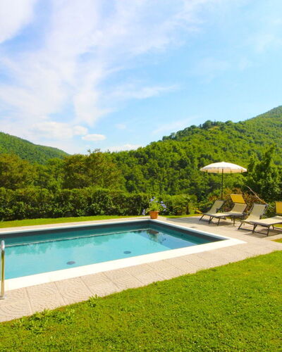La Casa del Nonno: Water, Sky, Cloud, Plant, Green, Swimming Pool, Azure, Natural Landscape, Tree, Building