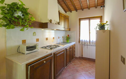 Villa le Balze: Kitchen, Countertop, Wood, Interior Design, Kitchen Appliance, Flooring, Furniture, Major Appliance, Room, Lighting