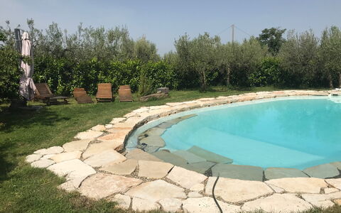 Villa Eleonora: Swimming Pool, Flagstone, Backyard, Landscaping, Yard, Water Feature, Resort, Outdoor Furniture