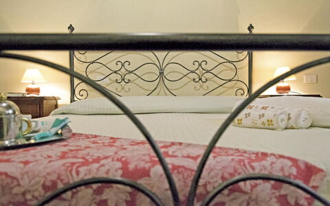 Casa Cristina: Iron, Bed Frame, Room, Bed, Furniture, Metal, Wall, Table, Interior Design, Architecture