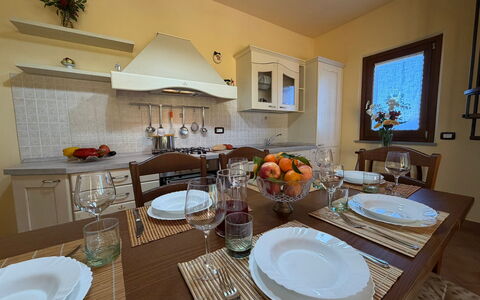 Villa Mira: Furniture, Interior Design, Tableware, Table, Chair, Dining Room, Wood, Kitchen & Dining Room Table, Room, Flooring