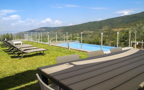 Villa Degli Ulivi: Property, Architecture, Real Estate, House, Deck, Sky, Design, Building, Roof, Swimming Pool
