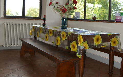 Villa Cafaggiola: Furniture, Table, Room, Tablecloth, Floor, Rectangle, Textile, Flooring, Kitchen & Dining Room Table, Linens