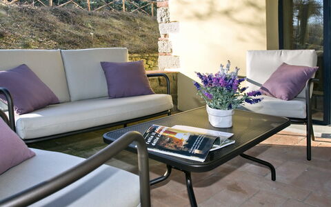 Villa Del Monte: Furniture, Coffee Table, Purple, Table, Living Room, Couch, Room, Patio, Interior Design, Outdoor Furniture