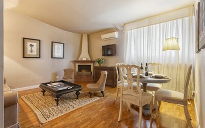 Nido Tornabuoni: Room, Interior Design, Property, Furniture, Living Room, Floor, Building, Ceiling, Yellow, Table