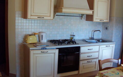 Bazzani Apartments In Siena: Cabinetry, Countertop, Furniture, Property, Sink, Building, Tap, Blue, Kitchen, Wood