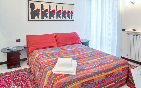 Villa Helvezia - Levanto: Bedroom, Bed, Bed Sheet, Bedding, Furniture, Room, Bed Frame, Red, Property, Floor