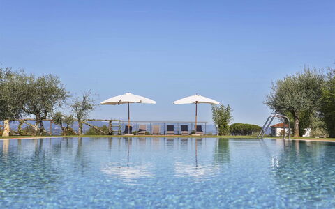 Il Grappolo: Water, Resort, Property, Swimming Pool, Sky, Leisure, Tree, Vacation, Reflecting Pool, Architecture