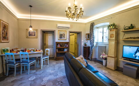 Michelangelo Cortona Apartment: Property, Room, Building, Interior Design, Living Room, Furniture, Real Estate, House, Home, Yellow