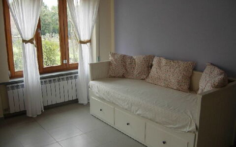 Gli Appartamenti Di Manuela: Furniture, Room, Property, Floor, Interior Design, Couch, Curtain, House, Wall, Window Treatment