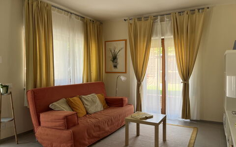 Gli Appartamenti Di Manuela: Furniture, Property, Table, Building, Comfort, Wood, Curtain, Textile, House, Couch