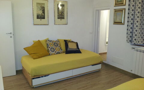 Guelfa House: Furniture, Room, Property, Bed, Bedroom, Yellow, Floor, Interior Design, Wall, Bed Frame