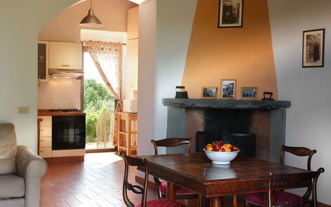 Pozzo Dei Desideri: Table, Furniture, Property, Chair, Wood, Interior Design, Living Room, Lighting, Floor, Picture Frame