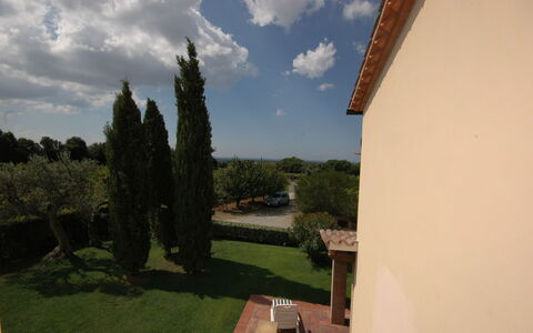 Poderino: Property, Sky, Tree, House, Grass, Cloud, Room, Architecture, Plant, Building