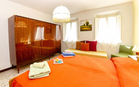 La Piccola Margherita: Room, Bedroom, Furniture, Property, Bed, Interior Design, Orange, Bed Sheet, Suite, Building