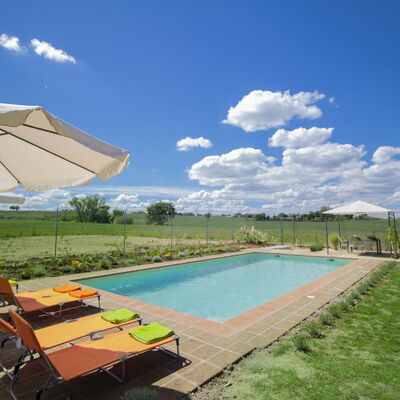 Le Nuvole: Property, Swimming Pool, Real Estate, Sky, House, Shade, Home, Vacation, Resort, Building